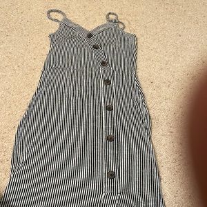 Woman’s stripped dress with buttons on the middle and size small